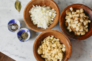 Garlic Soup Edited 4 (1) prep ingredients: onions, garlic, potato, bay leaf, salt, pepper, and marjoram.