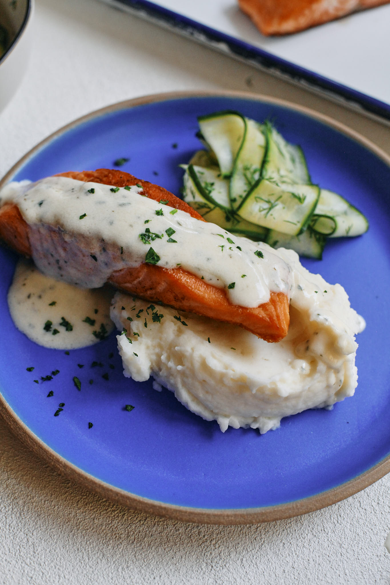 finished plate of salmon with norwegian butter sauce
