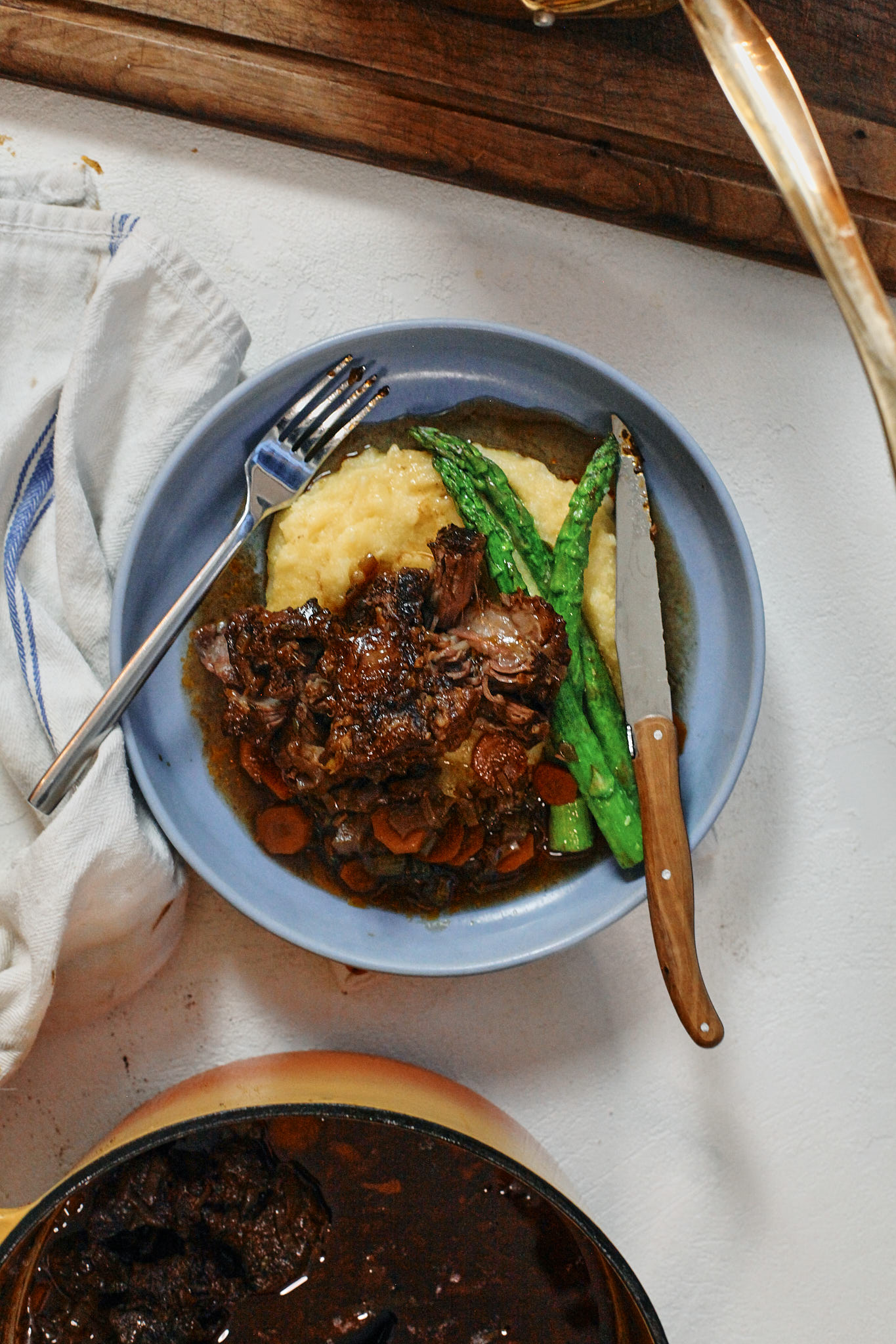 Ox Tail 13 braised oxtail over polenta with asparagus