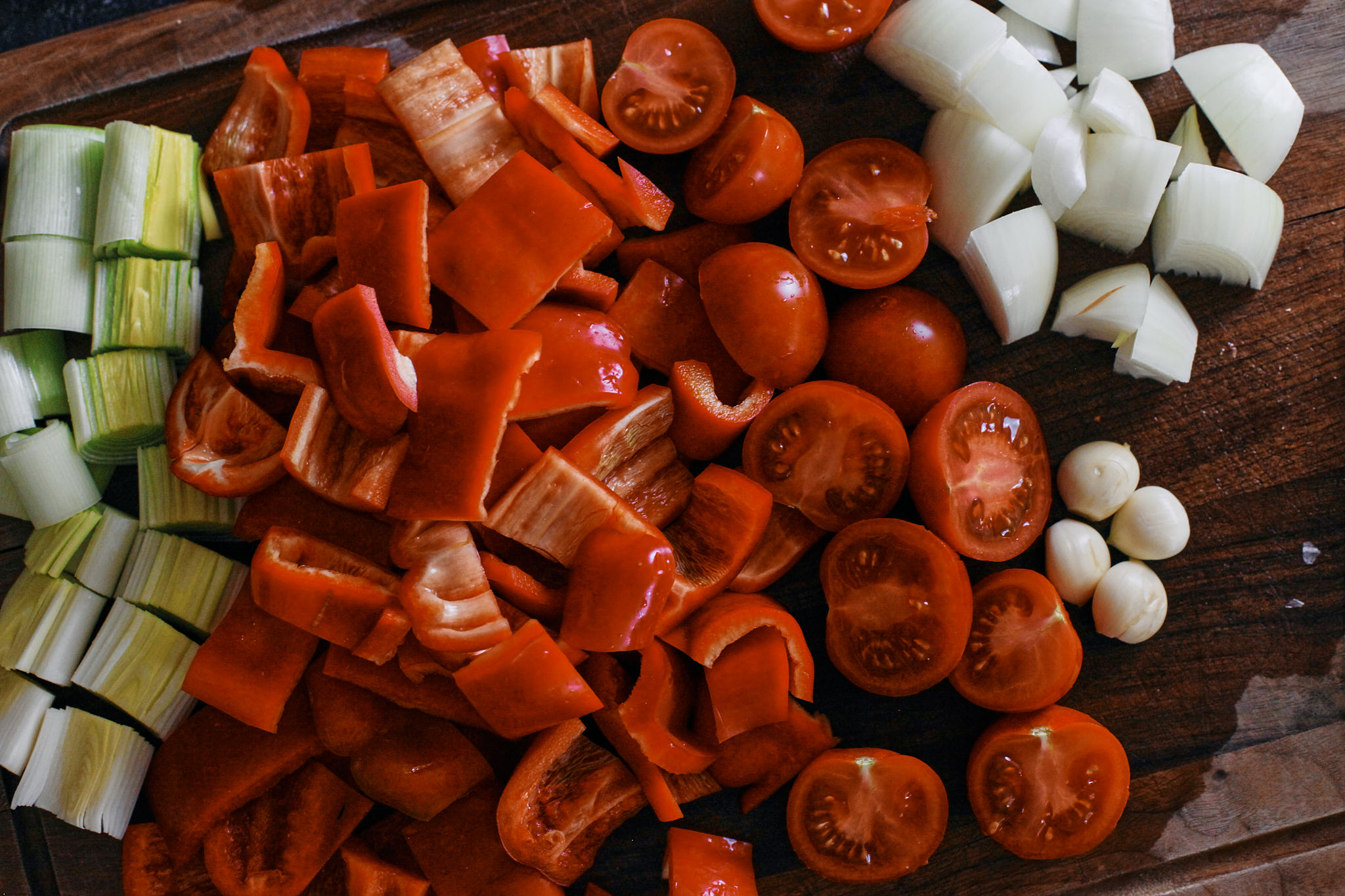 chopped leeks, red pepper, tomatoes, onions and garlic