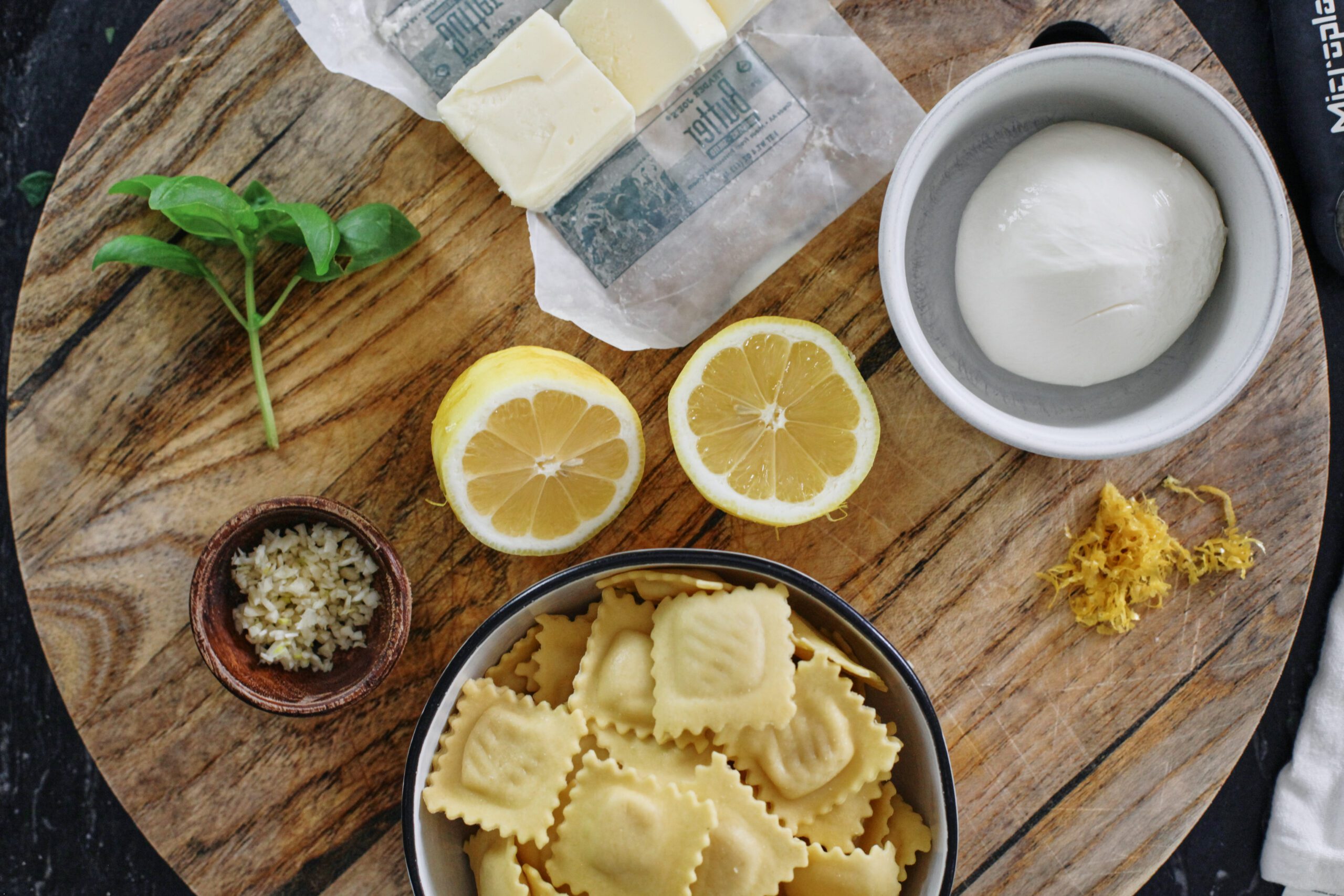 ingredients for burrata & lemon ravioli: ravioli, basil, lemon, burrata, butter, garlic