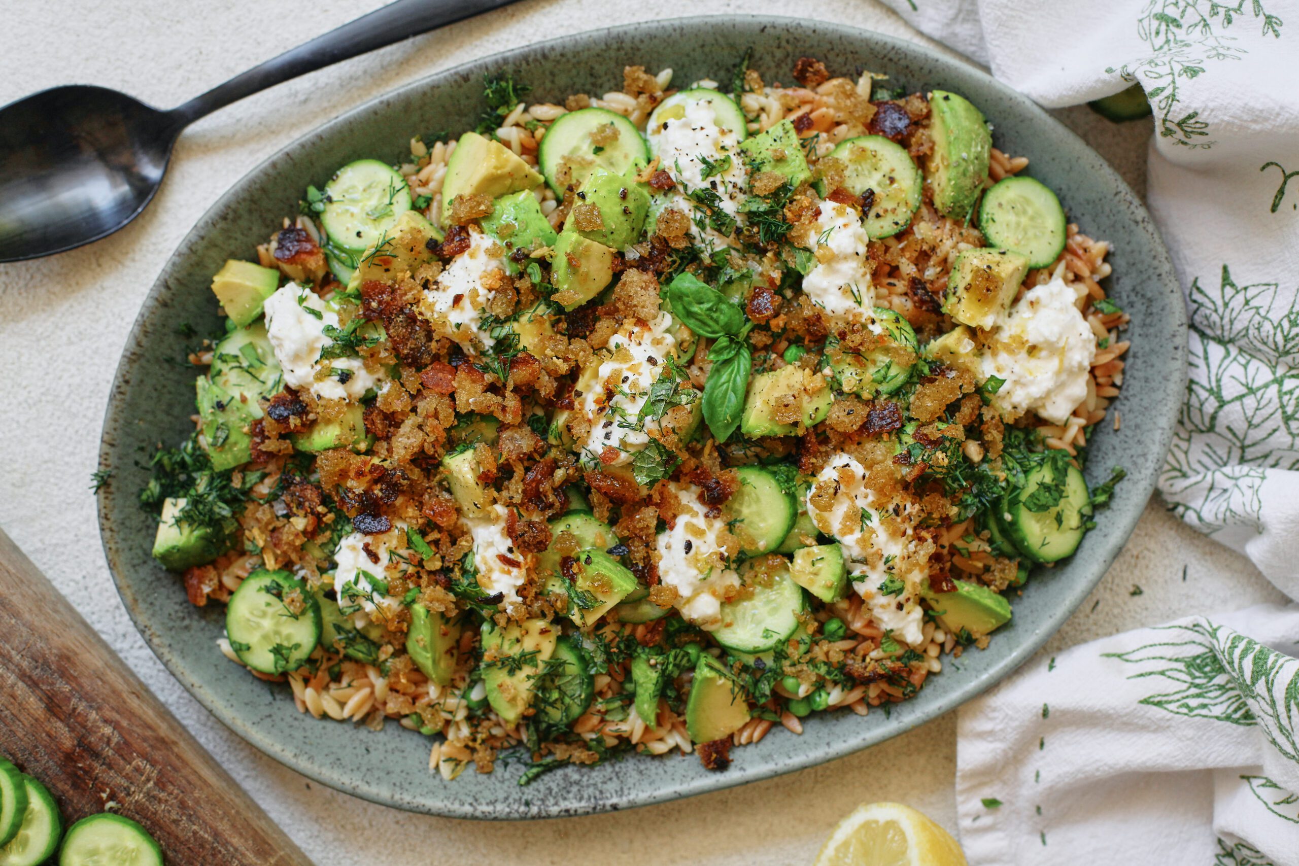 toasted orzo pasta salad with greens, burrata and garlic breadcrumbs