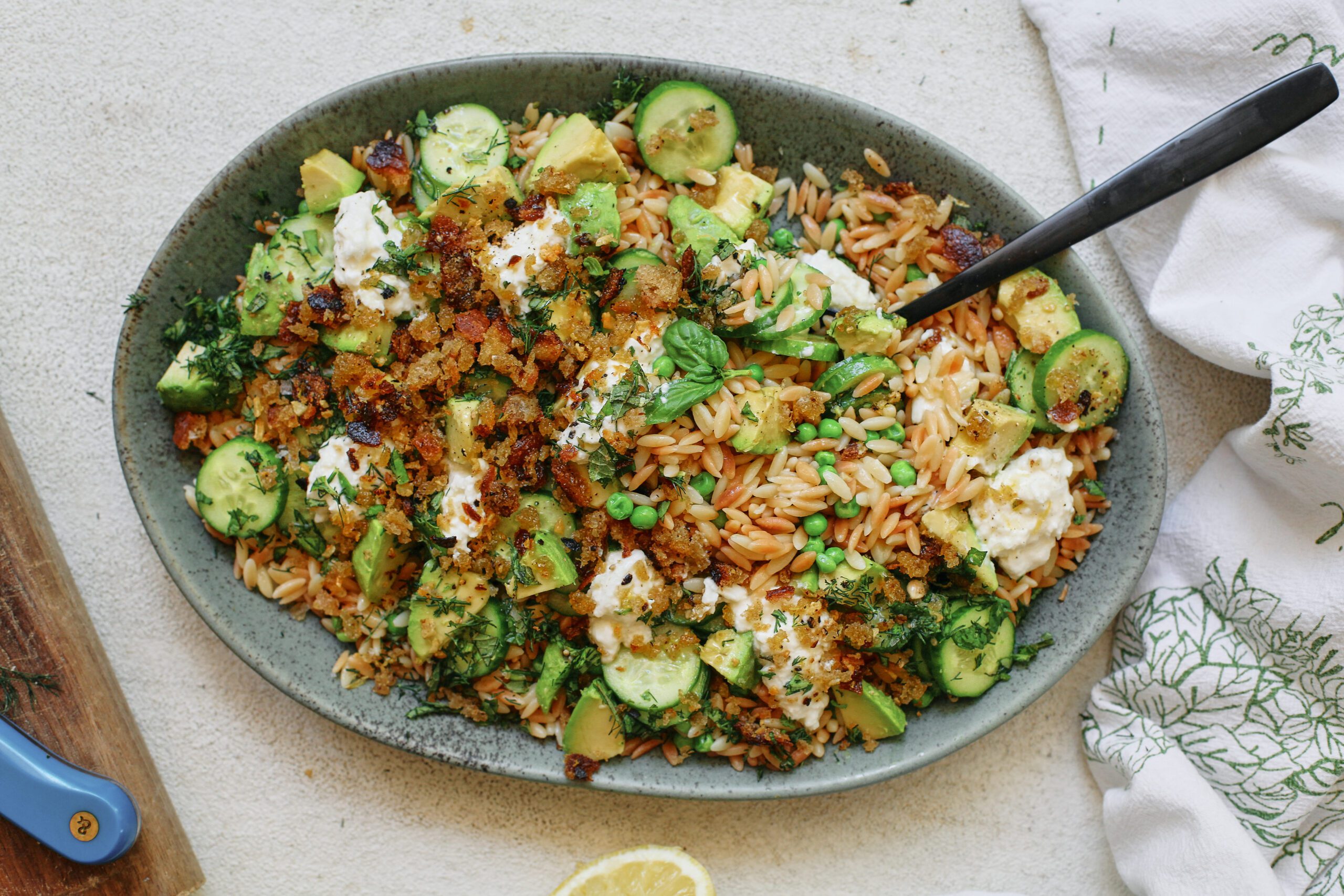 toasted orzo pasta salad with greens, burrata and garlic breadcrumbs