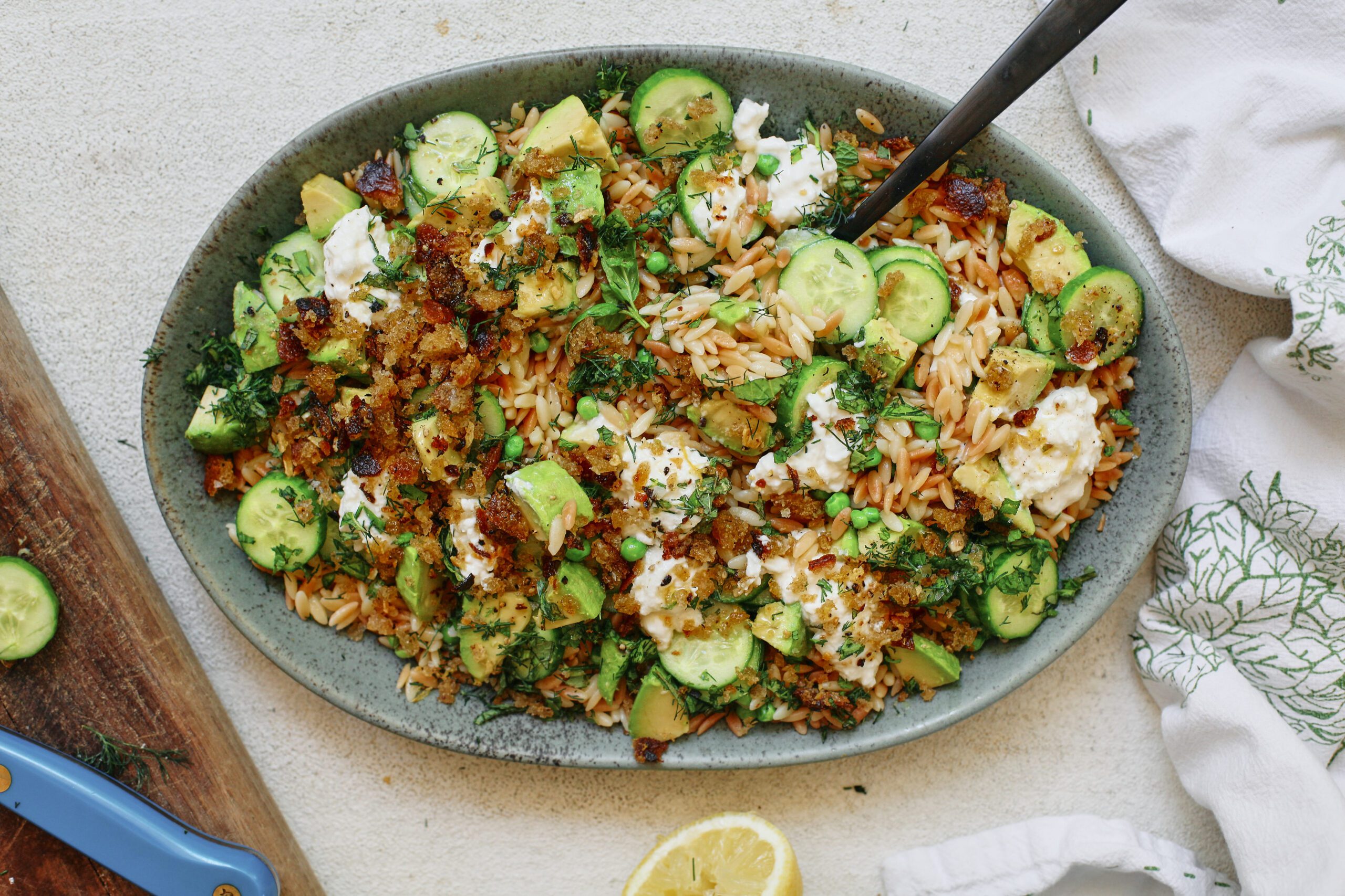 toasted orzo pasta salad with greens, burrata and garlic breadcrumbs