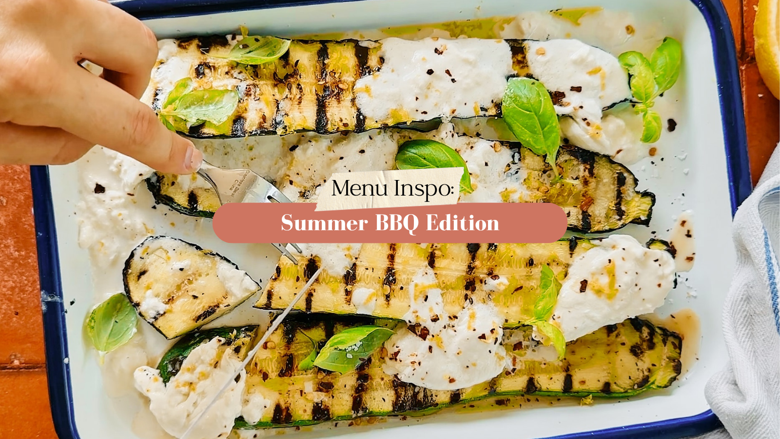 text that reads "menu inspo: summer bbq edition" over a photo of grilled zucchini with burrata