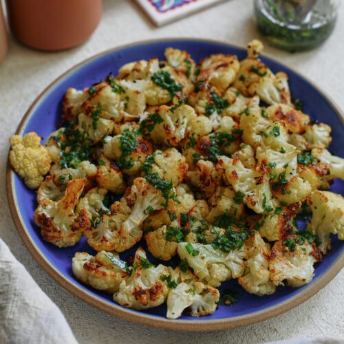 salt and vinegar cauliflower on a blue plate