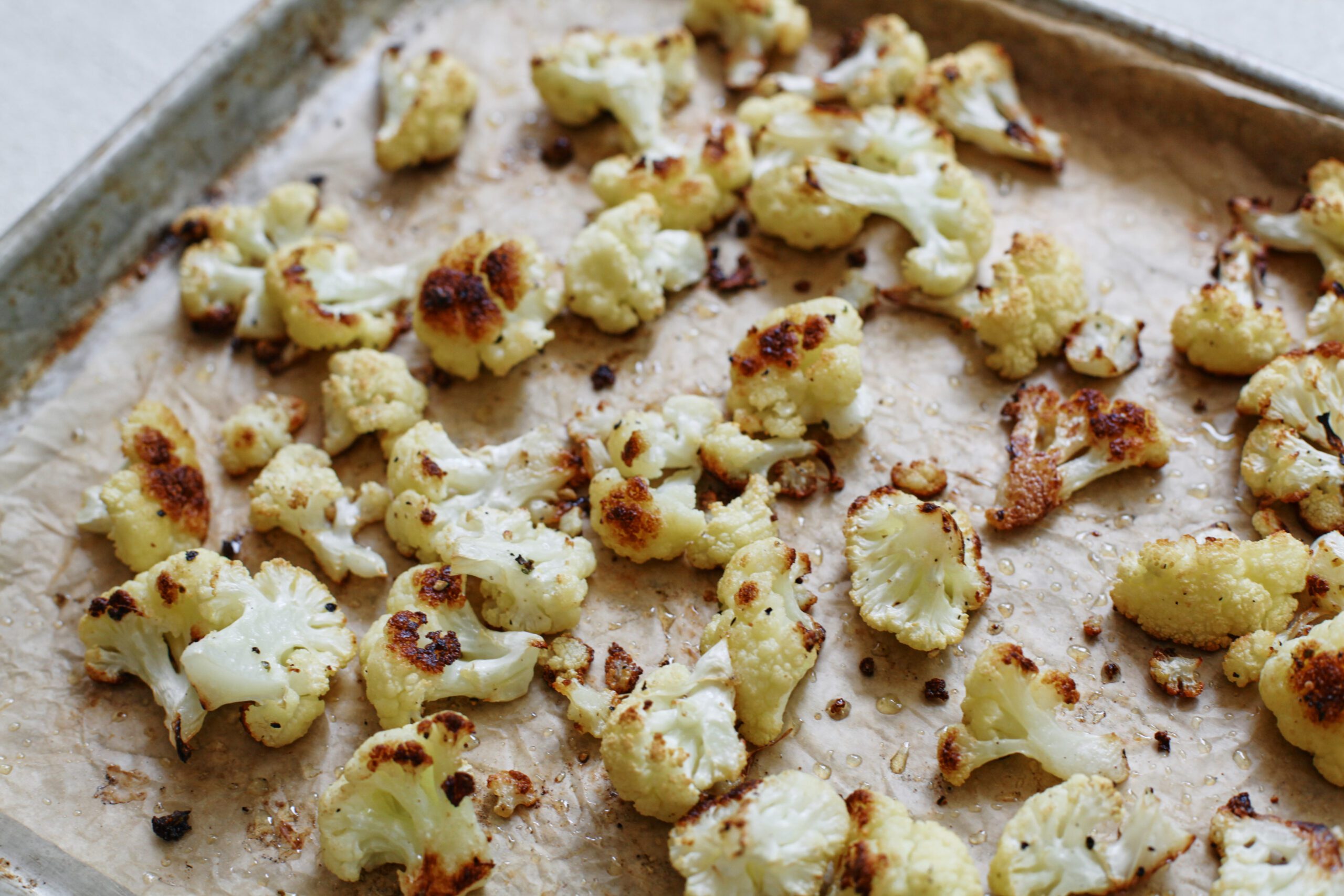 Salt and Vinegar Cauliflower 8 roasted cauliflower on a parchment lined pan