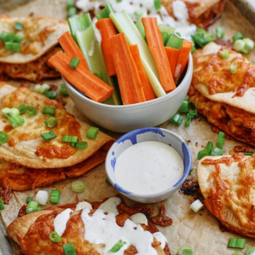 buffalo chicken sheet pan tacos with homemade ranch dressing and celery and carrot sticks