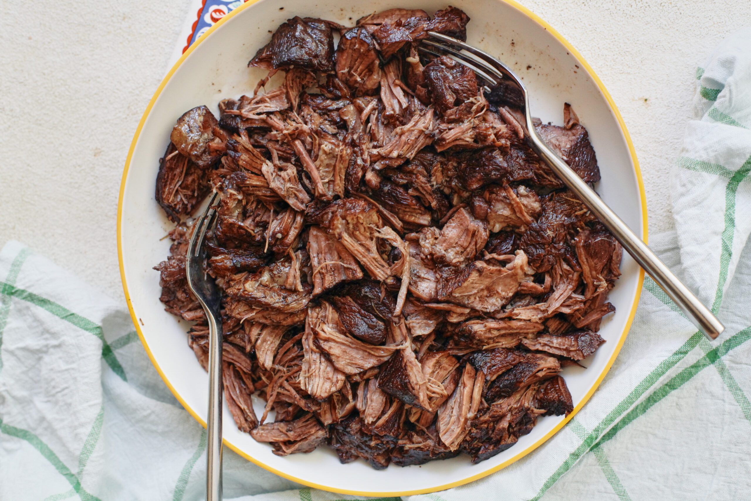 shredded beef after being braised