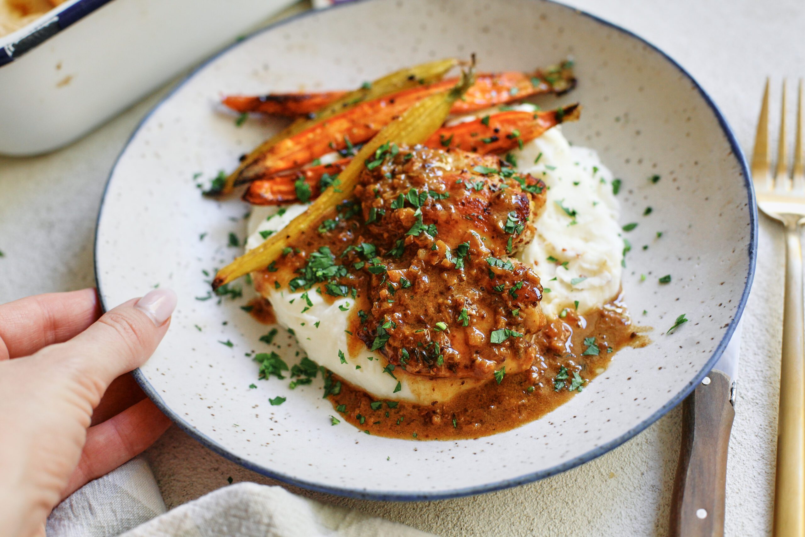garlic herb chicken with honey butter carrots and mashed potatoes