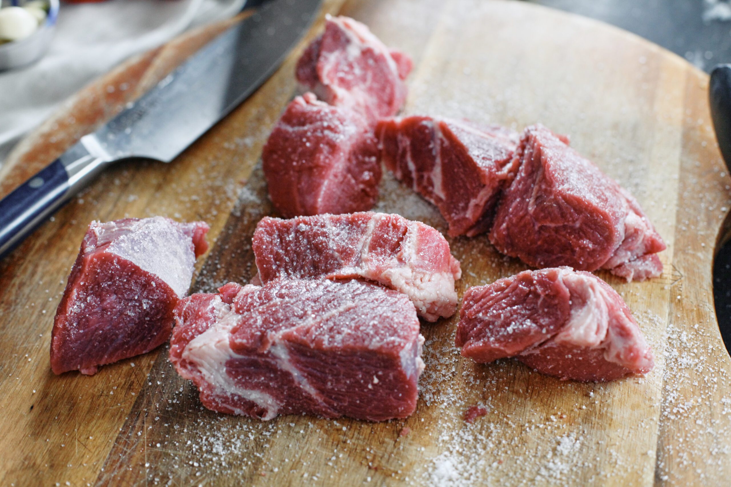chuck roast cut into large pieces and seasoned with salt